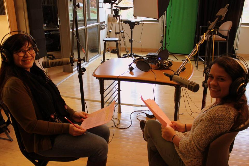 Elena Foulis recording a podcast with another person.