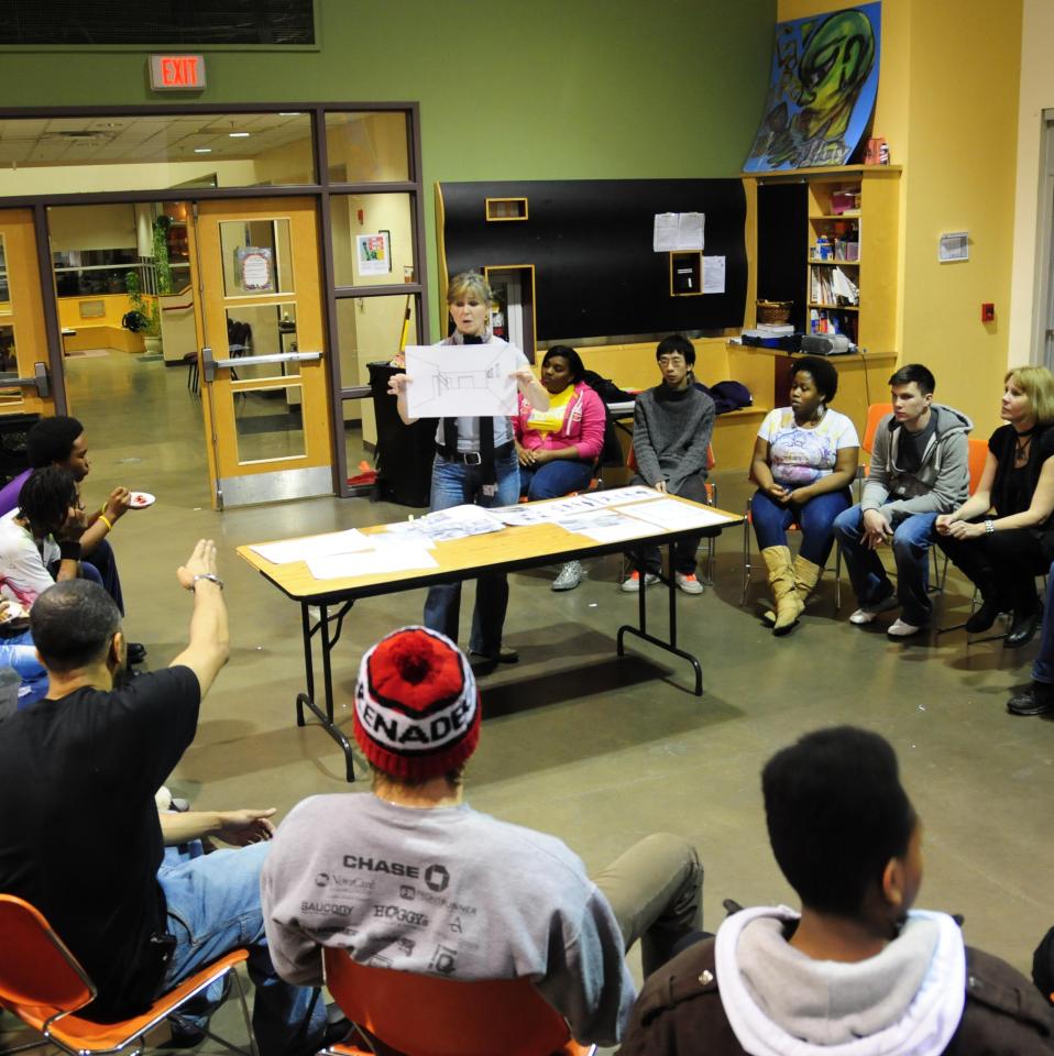 Susan Melsop teaching a classroom of students.